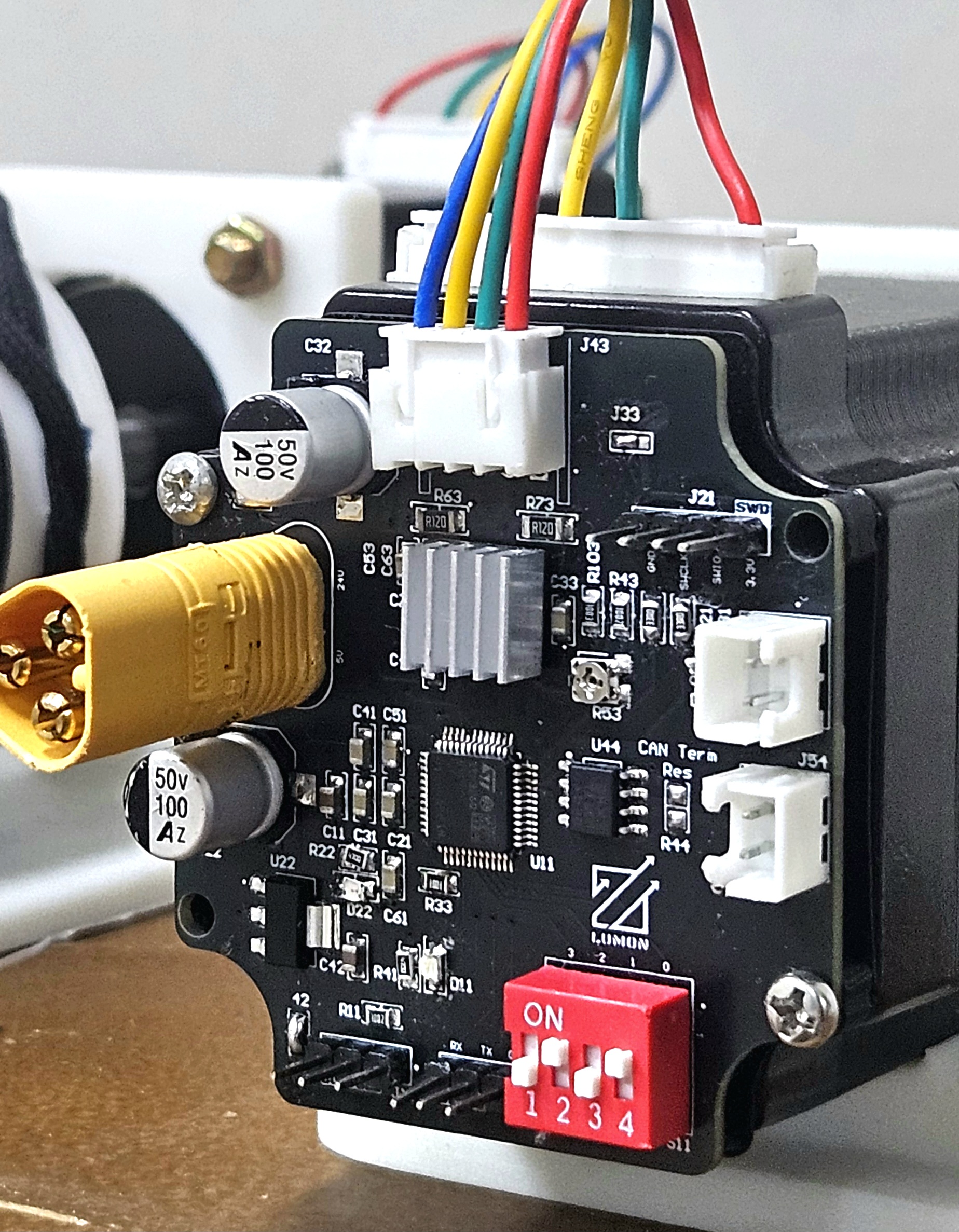 Close-up of the custom Team Lumon motor-controller PCB installed on the robot